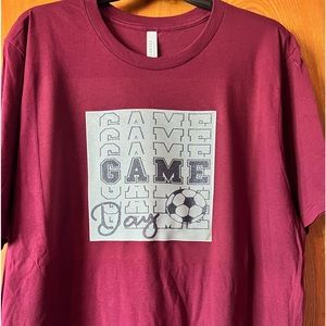 Xxl Bella canvas custom made shirt. With soccer maroon